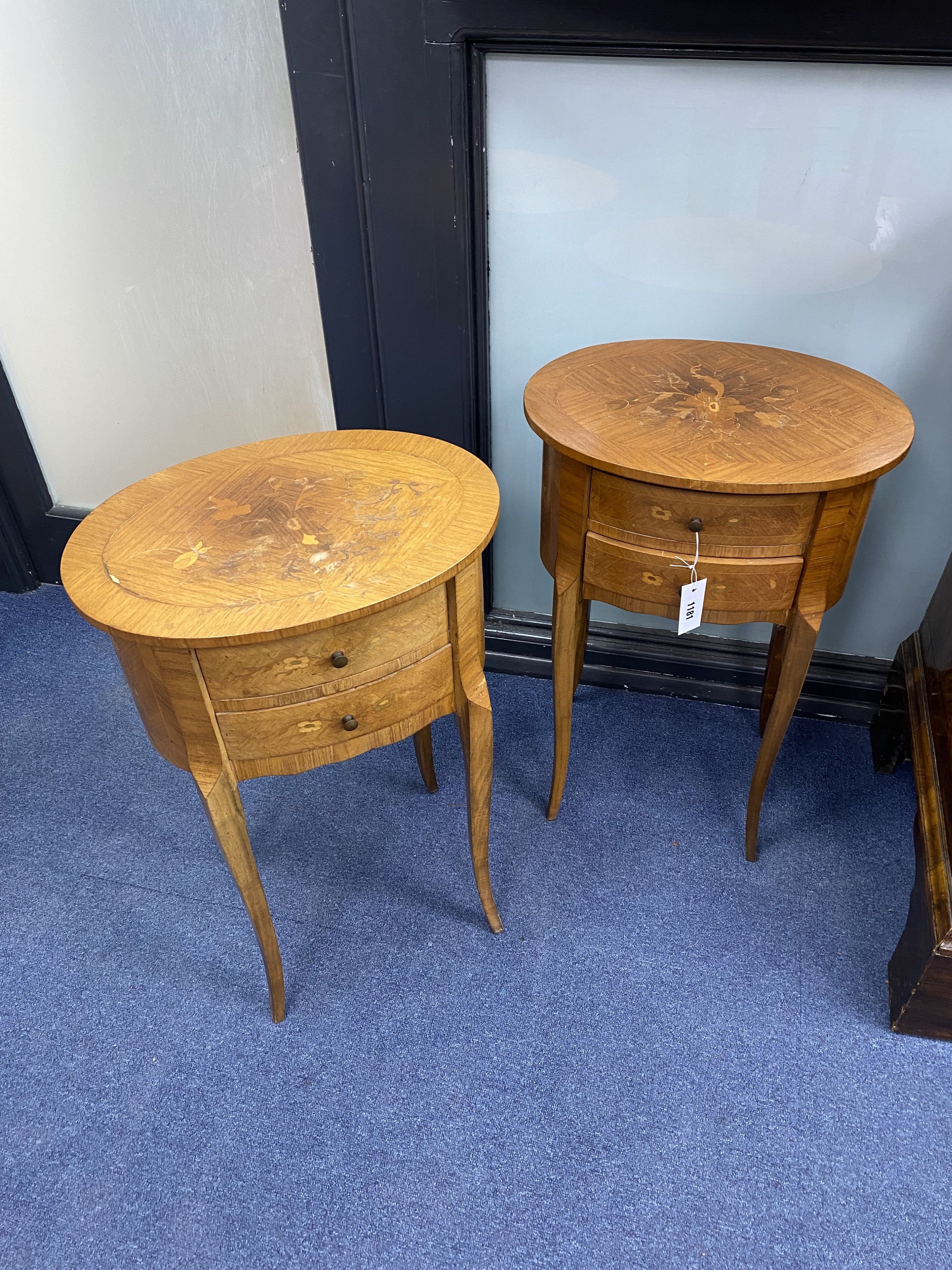 A pair of oval marquetry commodes, width 43cm, depth 31cm, height 64cm